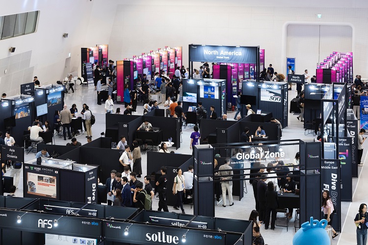 Overhead view of startup exhibition and meeting booths at Try Everything 2025 inside DDP