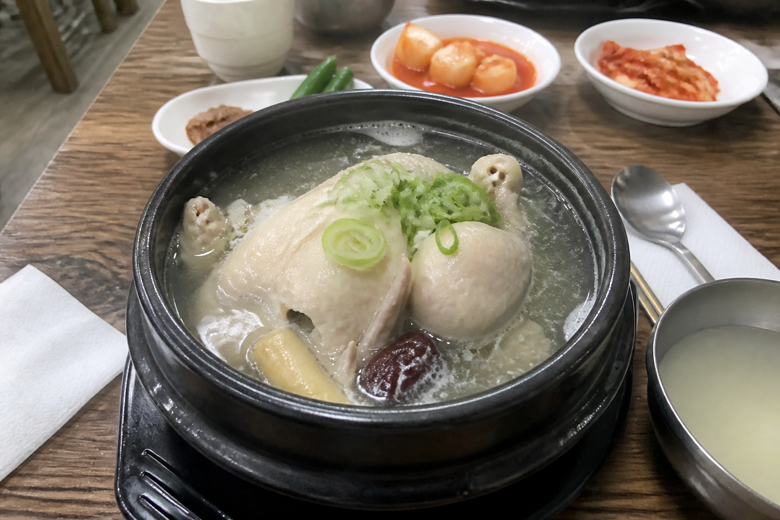 A natural AI-generated SEOULIAN editorial photograph illustrating Samgye-tang