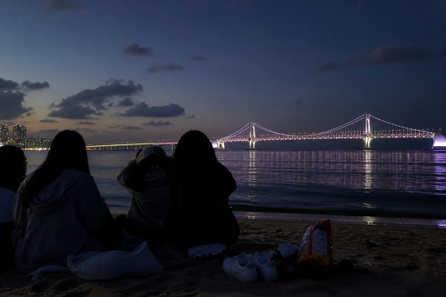 A natural AI-generated SEOULIAN editorial photograph illustrating Gwangalli Beach