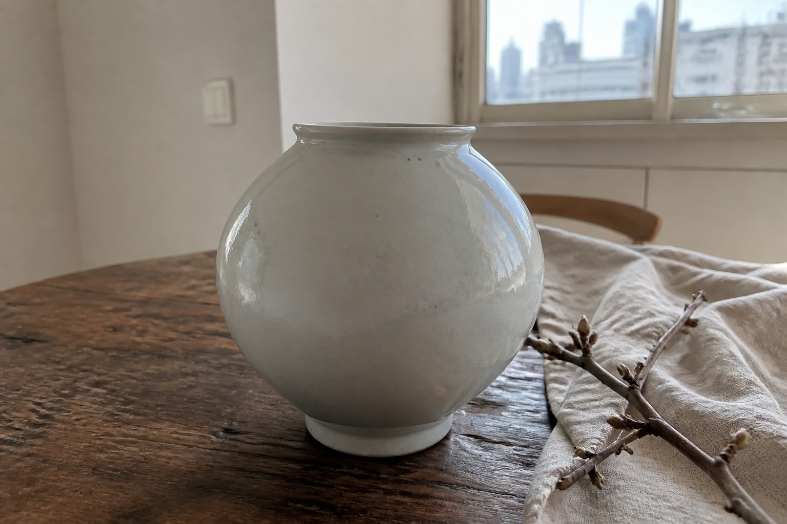 A natural AI-generated SEOULIAN editorial photograph illustrating Moon jar